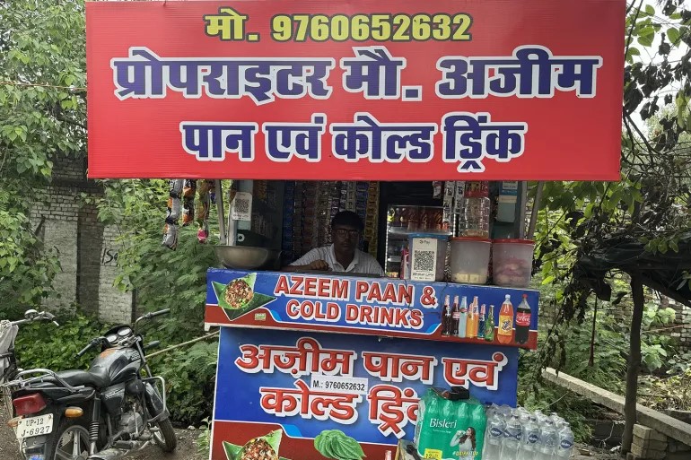 Mohammad Azeem's Pan and Coldrink Stall at Vehalna Chowk displays his name following a police order